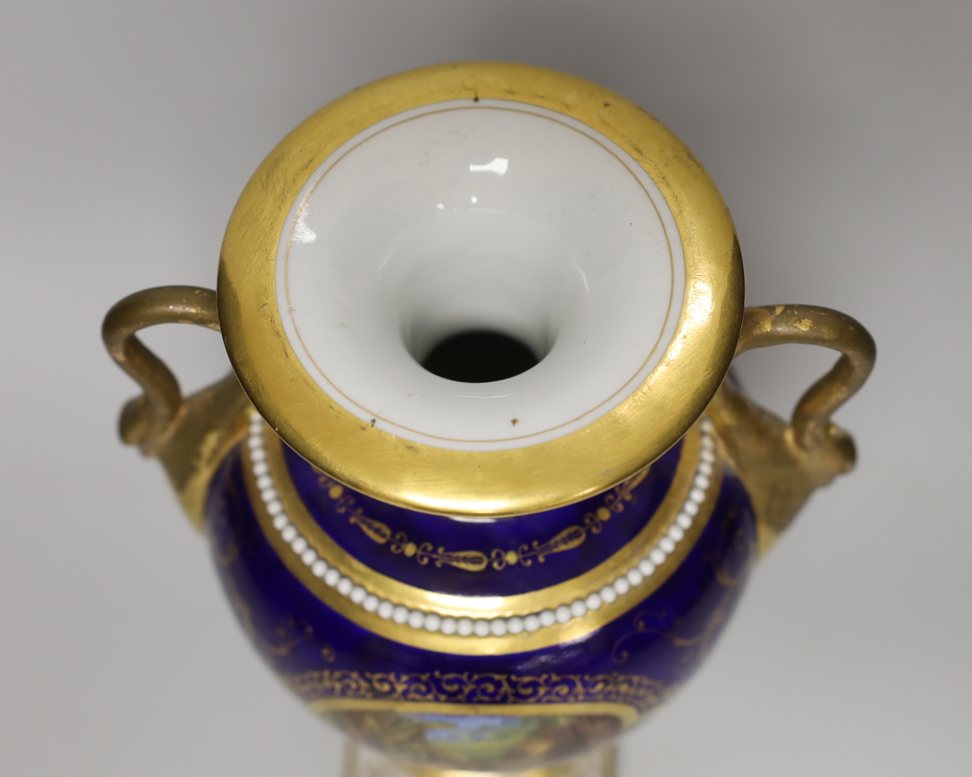 A Flight Barr and Barr Worcester vase with scenes from Robinson Crusoe, titled on the base, script and impressed marks, 27cm high